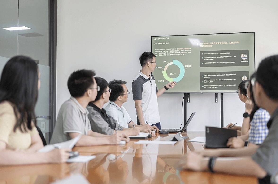 Yado R&D team reviewing a design in a meeting room