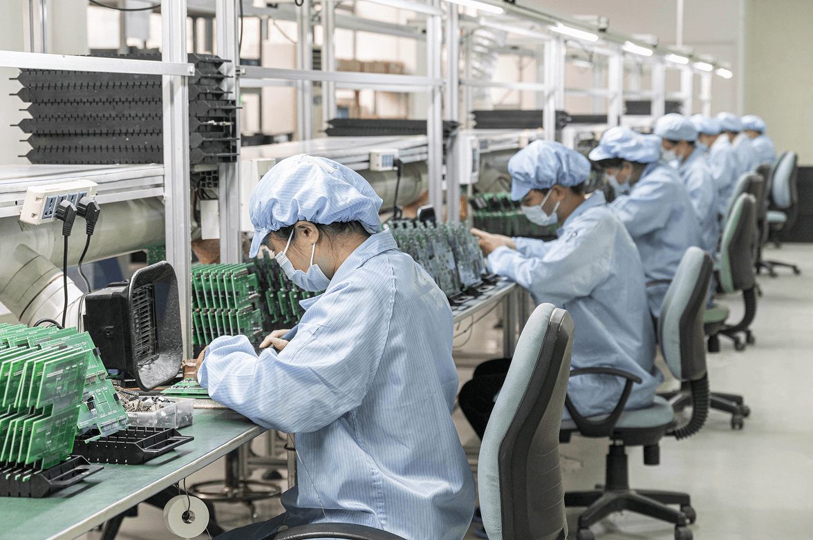 Yado assembly line with technicians building sensor boards