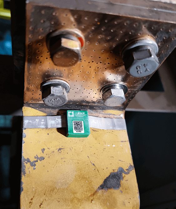Yado sensor tag fitted to a bolted busbar connection