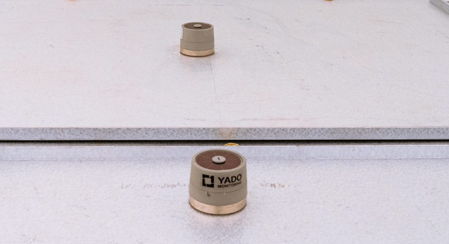 Yado Apollo Magnetic Thermal Sensors stuck to a switchgear enclosure
